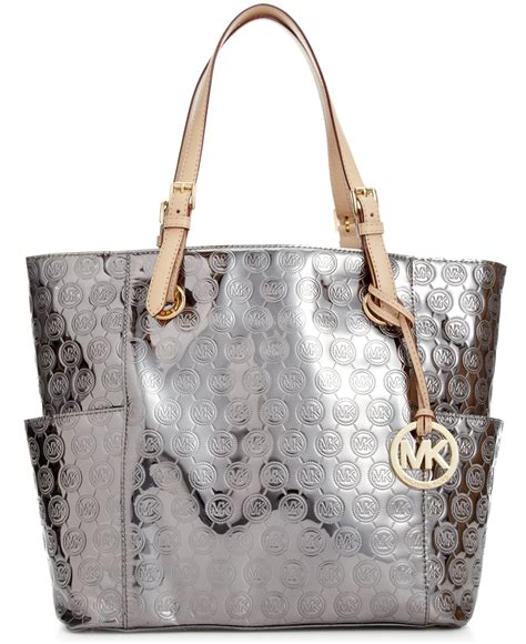 black michael kors bag with silver hardware|Michael Kors metallic silver handbags.